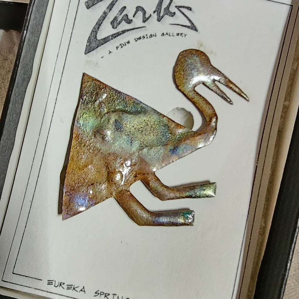 Heated copper? Art gallery bird pin from Zarks